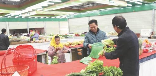 惠安39岁外来工改造农贸市场 老菜农永久免费摆摊